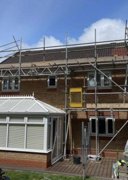 Domestic home with scaffolding and walkways