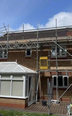 Domestic home with scaffolding and walkways