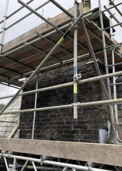 Scaffolding around country home