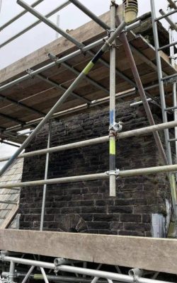 Scaffolding around country home