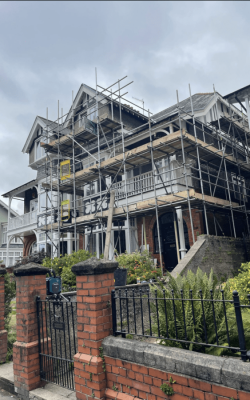 Large domestic home under scaffolding