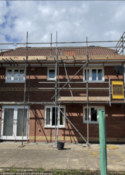 House covered in scaffolding