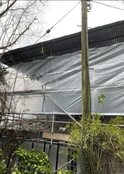 Temporary tin roof scaffolding